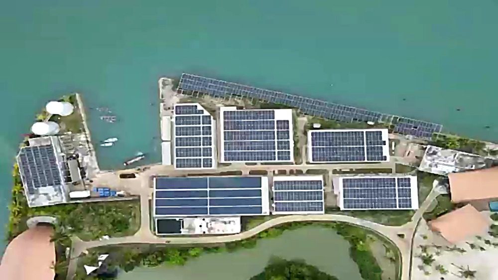 Aerial view of the tropical island resort PV installation
